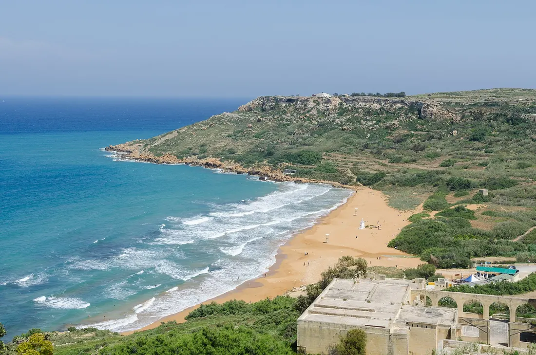 The red sand of Ramla Bay on Gozo